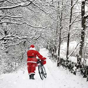 161118: Father Christmas walking bike through country