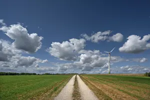 Energy: Field path and wind turbine in Franconian landscape
