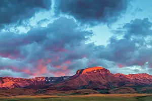 Choteau: Fiery sunrise light strikes Ear Mountain