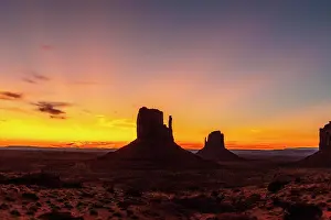 Table: First pink sunrise lights at Monument Valley in