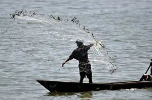 Casting: Fisherman casting net