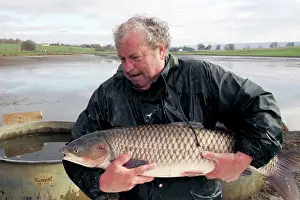 Anglers: Fisherman - with caught carp