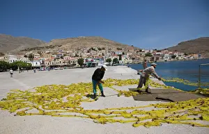 Rhodes: Fishermen drying their nets on the island of Halki
