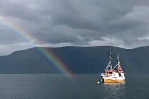 Prismatic: Fishing boat in fjord with rainbow, Lyngseidet