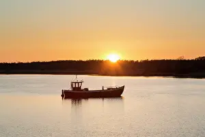 Ruegen: Fishing boat at sunset - island of Ruegen - Germany