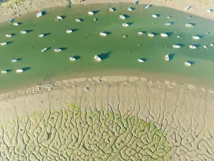 Tide: Fishing boats in the Carreras river and its adjacent