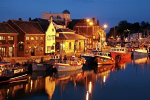 Quay: Fishing boats and Custom House Quay at dusk, Weymouth