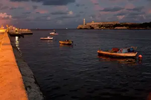 Havana: Fishing boats and El Morro Lighthouse, Havana