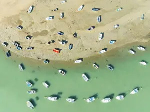 Boats: Fishing boats at low tide at the fishing village of Sancti Petri