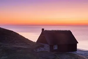 Oesterlen: Fishing hut at the coast of Havaeng at sunrise -