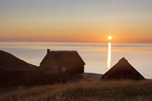 Oesterlen: Fishing huts at the coast of Havaeng at sunrise