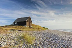 Cottages: Fishing huts in the dunes along the Baltic Sea