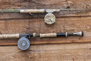Recreation: Fishing poles on cabin wall at fishing camp on the Alagnak