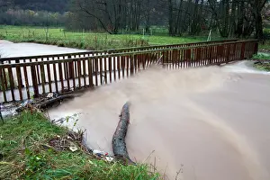Flash: Flash flood - damage to footbridge after torrential