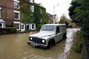 Landrover: Flooding - Landrover driving along flooded road