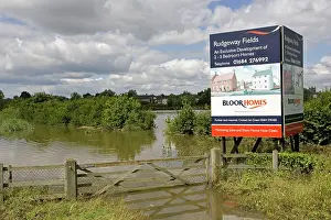 Inundated: Flooding - Large bill board adverting exclusive