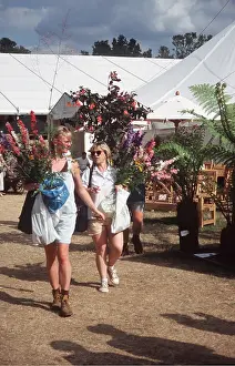 Hobbies: FLOWER SHOW - women with flowers at hampton court