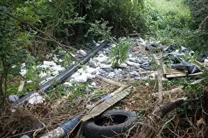 Hedges: Fly tipping builders rubbish dumped in hedge