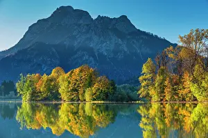 Artificial: Forggensee in autumn, behind it the Sauling, Ammergau
