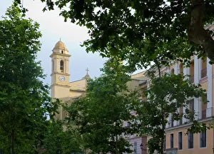 Manmade: France, Corsica. Church and apartment buildings