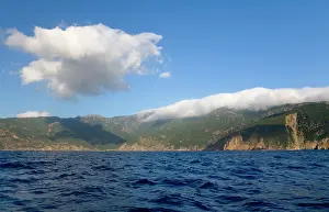 Smith: France, Corsica. Clouds blow over peaks