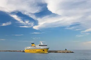 Ferry: France, Corsica. Ferry below cirrus clouds