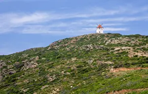 Lonesome: France, Corsica. Old windmill on ridge on