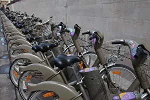 Bicycle: France, Paris. Line of bicycles for rent