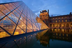 Glass: France, Paris. The Louvre at twilight