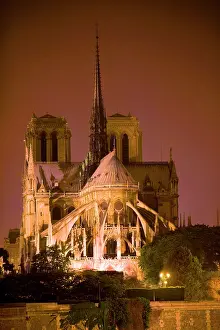 Worship: France, Paris. Notre Dame Cathedral lit