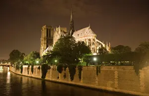 Paris: France, Paris. Notre Dame Cathedral lit