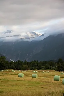 Roll: Franz Josef, New Zealand. Farmland surrounding