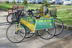 Bicycles: Free to Ride OYB yellow bike rental docking station