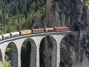 Transport: Freigth train passing the Landwasserviadukt near