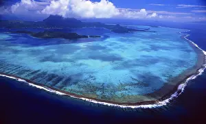 Aerials: French Polynesia: Helicopter flight and aerial view of the island of Bora Bora