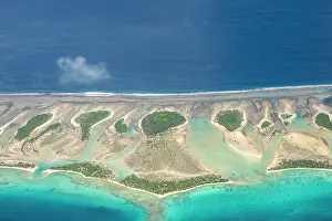 Polynesia: French Polynesia, Tikehau Atoll. Aerial of the atoll