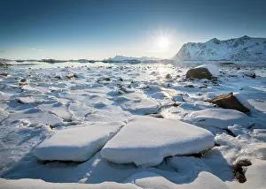 Floes: Frozen fjord with ice floes in winter landscape