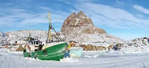 Fishery: The frozen harbor of Uummannaq during winter in