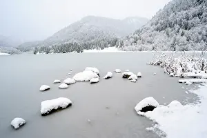Winterlandscape: frozen mountain lake in winter