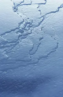 Waves: Frozen River, Alaska