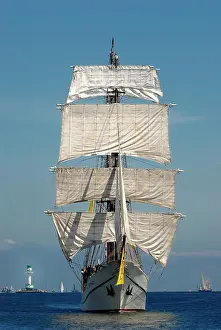 Masted: Fully rigged three-masted barque, traditional sailing