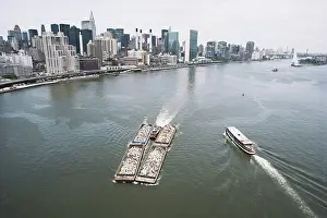 Skyscrapers: Garbage Scow on East River