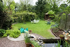 Attractive: Garden - attractive suburban back garden with pond