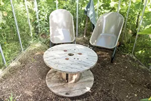 Recycling: Garden furniture in a greenhouse in summer, Moselle