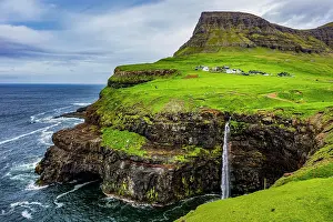 Faroe: Gasadalur waterfall into the ocean, Vagar, Faroe