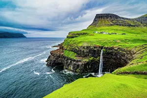 Faroe: Gasadalur waterfall into the ocean, Vagar, Faroe