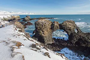 Circular: Gatklettur Arch Rock cliff with circular arch
