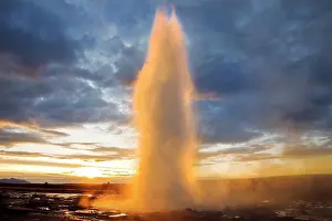 Fountain: Geysir Strokkur at sunrise in the geothermal area