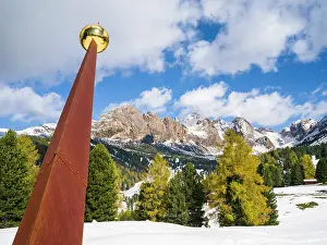 Larix: Giant sundial. Geisler mountain range in the dolomites