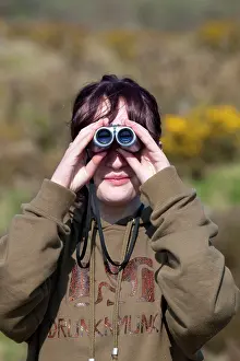 Binoculars: Girl Birdwatching using binoculars